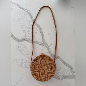 Round Woven Straw Crossbody Bag in Brown